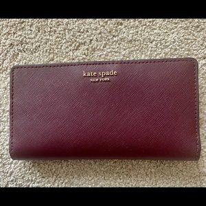 Kate Spade large slim billfold wallet- Cameron- cherrywood color- NWT